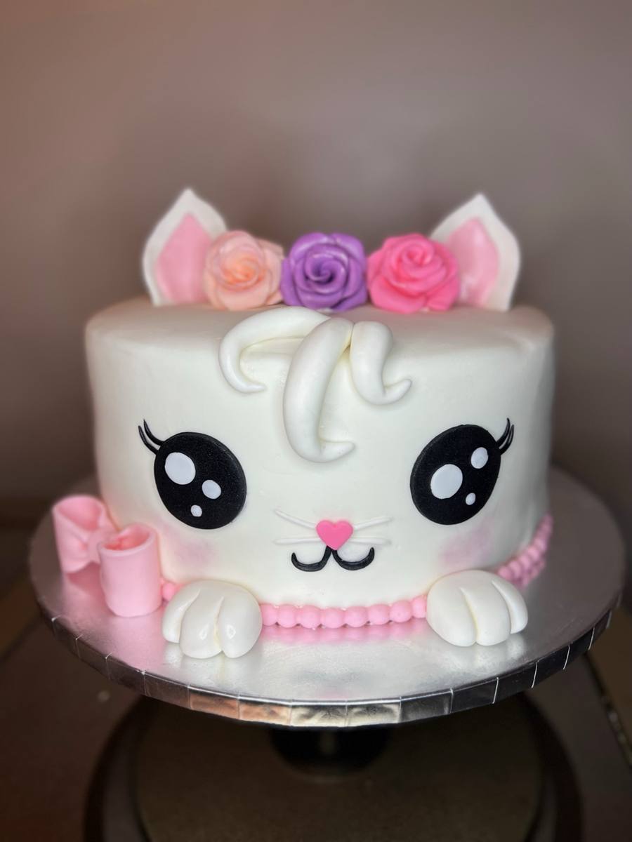 White fondant kitten-face novelty cake with pastel roses by Cakes by Steph, Leesburg VA