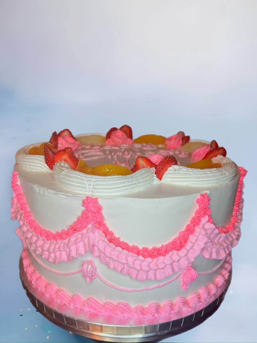 White cake with pink piped swags, strawberries and peach slices by Cakes by Steph, Leesburg VA