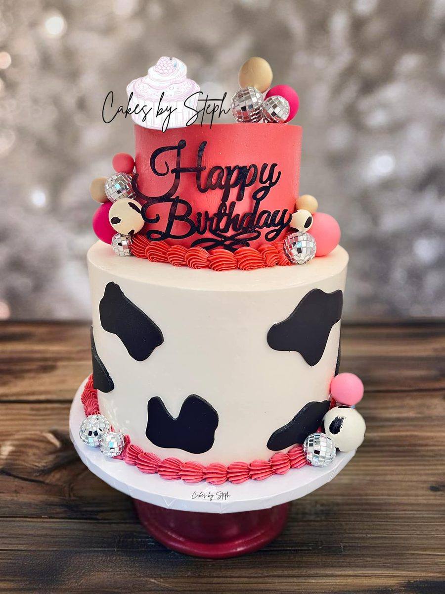 Two tier cow print birthday cake with disco balls by Cakes by Steph, Leesburg VA