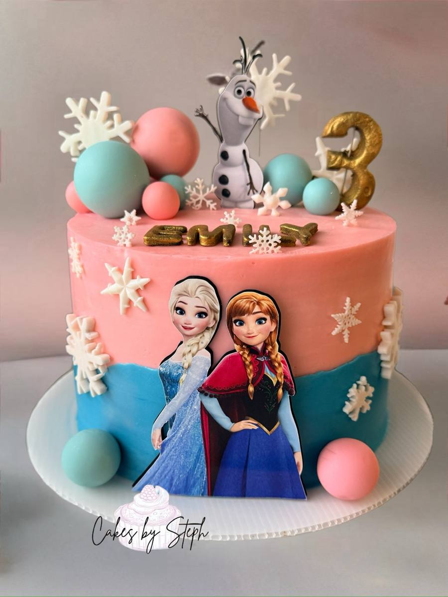 Frozen-themed pink and blue cake with Elsa, Anna, Olaf and gold 3 by Cakes by Steph, Leesburg VA