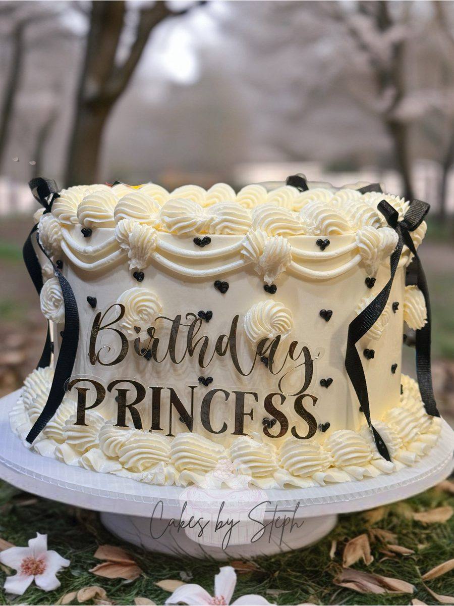 Vintage piped buttercream birthday princess cake with black bows by Cakes by Steph, Leesburg VA