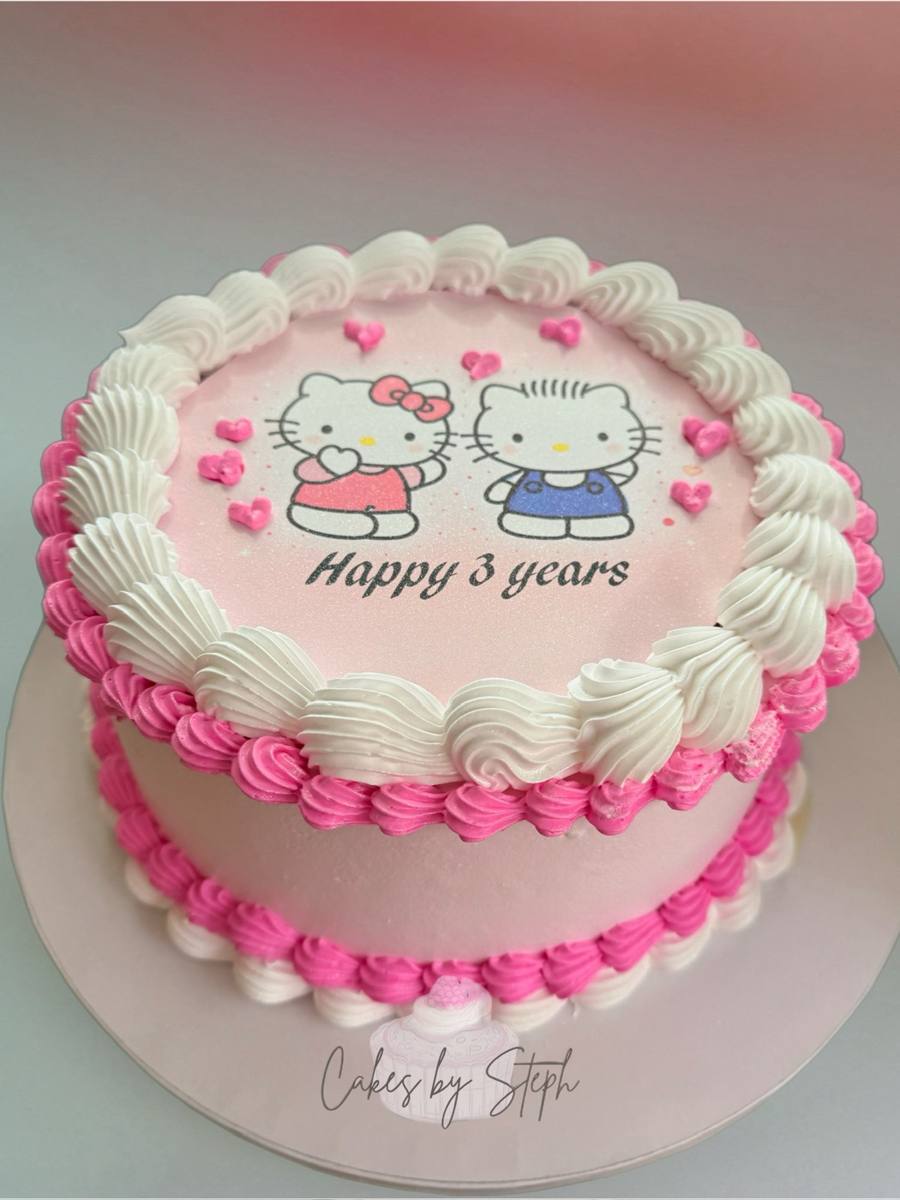 Pink Hello Kitty cake reading "Happy 3 years" by Cakes by Steph, Leesburg VA