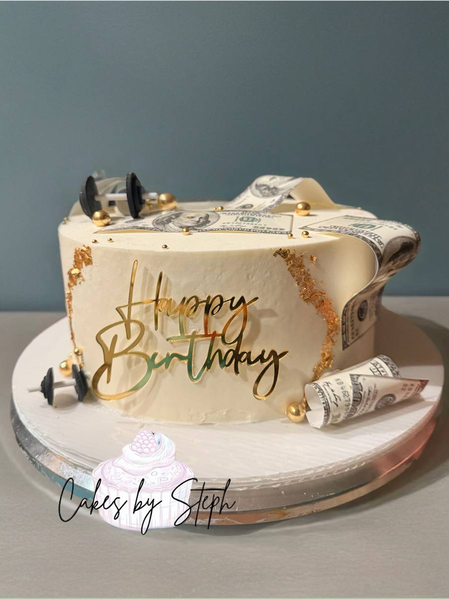 White cake with gold "Happy Birthday", dollar bills and dumbbells by Cakes by Steph, Leesburg VA