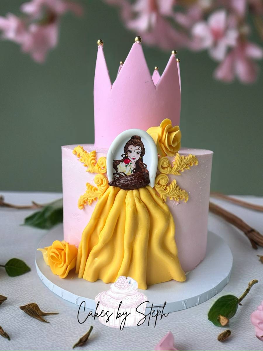 Pink cake with Princess Belle in yellow gown and crown by Cakes by Steph, Leesburg VA
