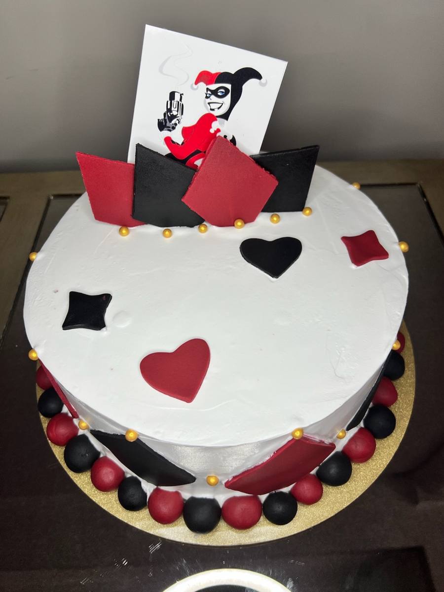 White Harley Quinn cake with red and black hearts and diamonds by Cakes by Steph, Leesburg VA