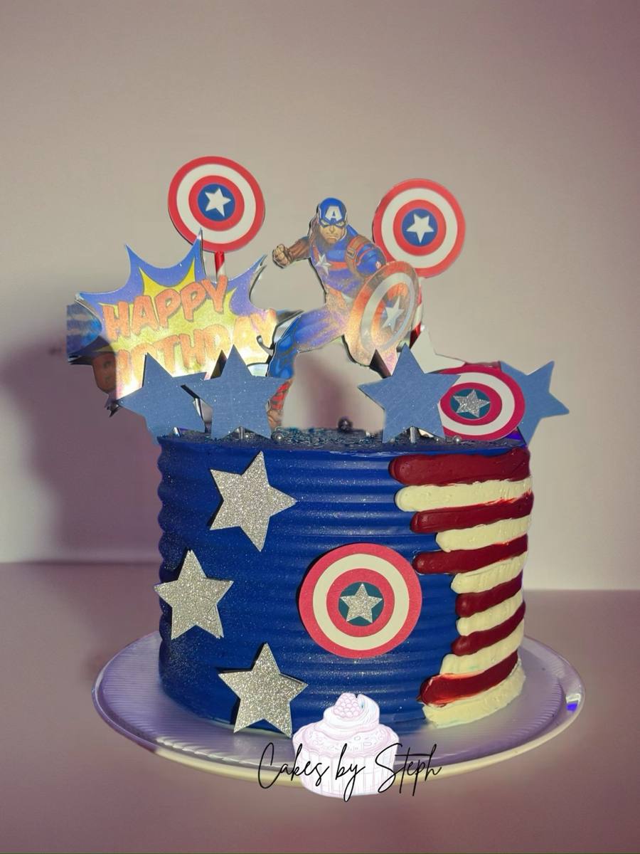 Blue Captain America cake, shield toppers, stars, stripes by Cakes by Steph, Leesburg VA