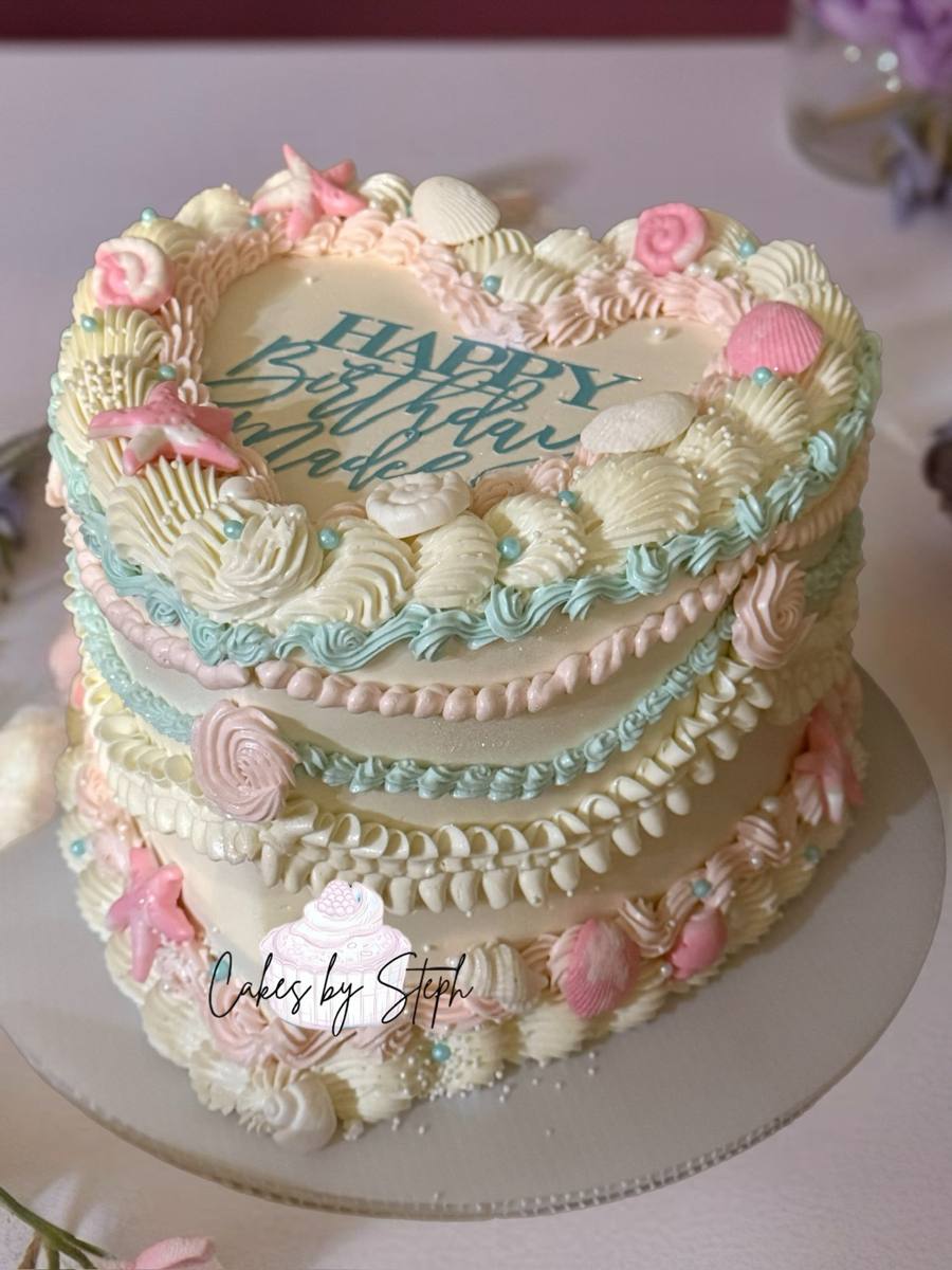 Cream heart vintage cake, pastel seashells, "Happy Birthday" by Cakes by Steph, Leesburg VA