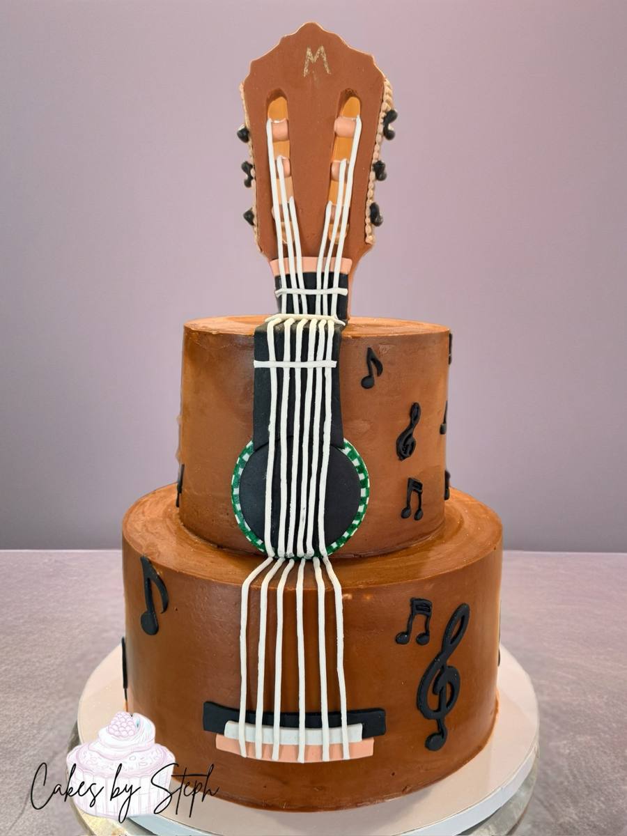 Two-tier brown guitar-themed cake with music notes by Cakes by Steph, Leesburg VA